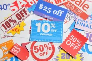 A bunch of coupons that are on top of each other