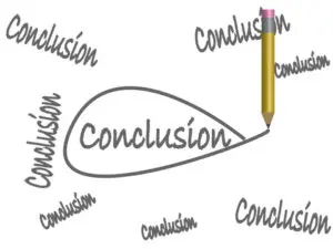 A pencil is writing the word conclusion on paper