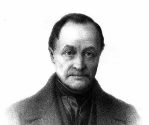 A black and white photo of an old man.