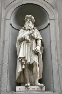 A statue of a man in a robe and beard.