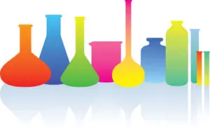 A row of colorful glass flasks and bottles.