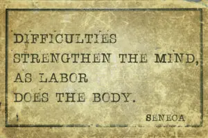 A quote from seneca on a piece of paper.