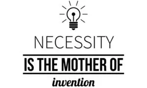 A light bulb with the words necessity is the mother of invention.