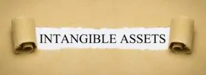 A torn piece of paper with the words " intangible assets ".