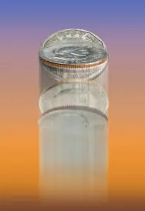 A bottle of water with a coin in it