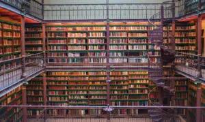 A large library with many books on the shelves.