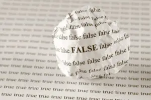 A close up of the word false on paper