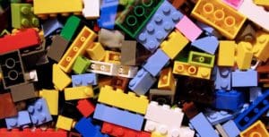 A pile of lego blocks in different colors.