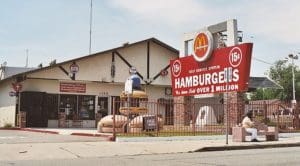 A hamburger restaurant with many items on the ground.